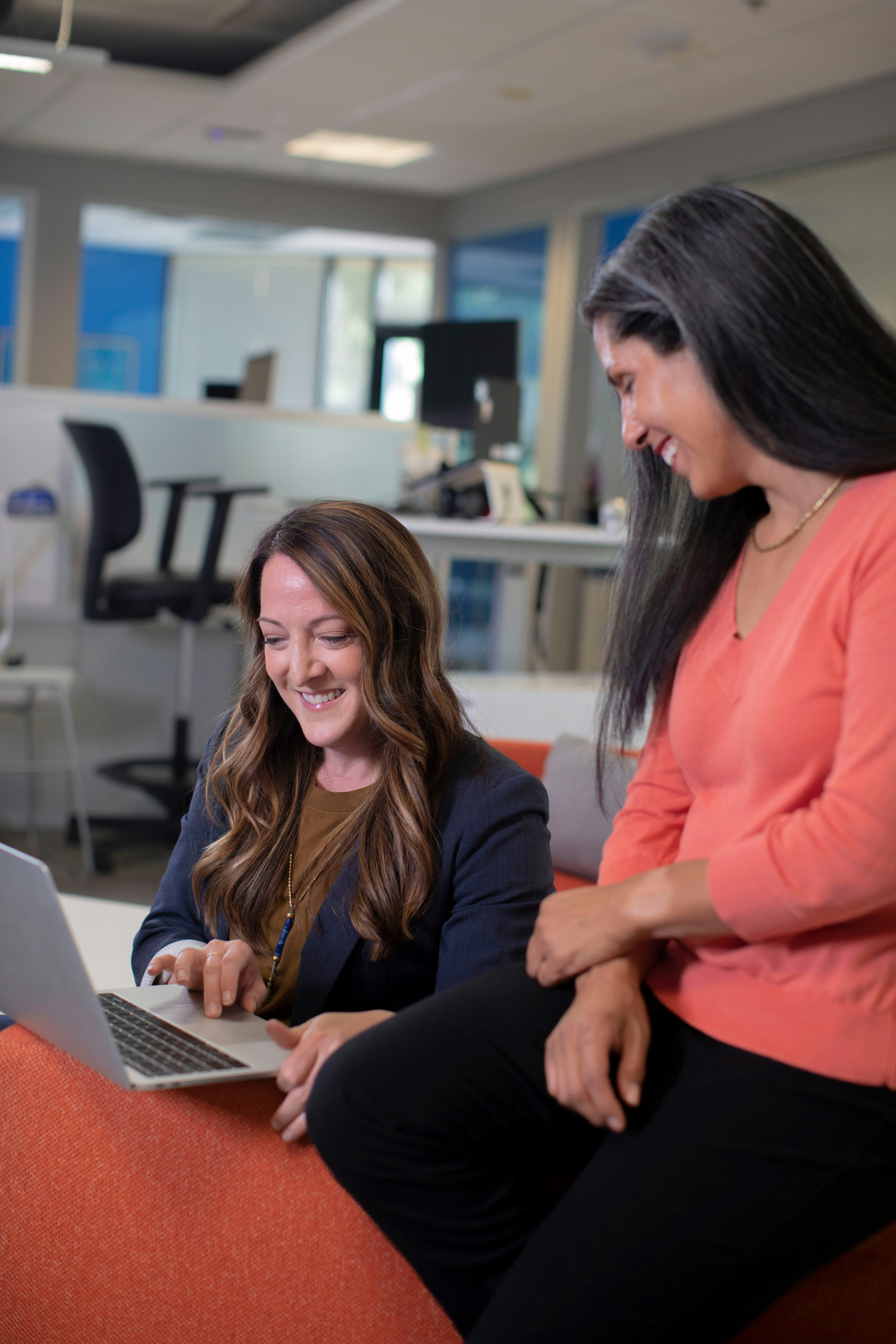 Two real estate agents in a modern office